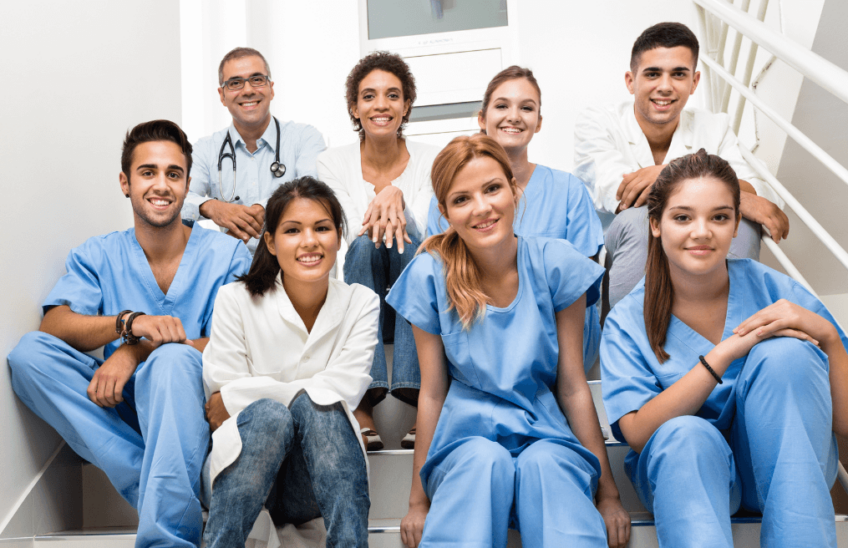 Students, advisors and Naturopathic Doctors pose for a photo at an Accredited School Program